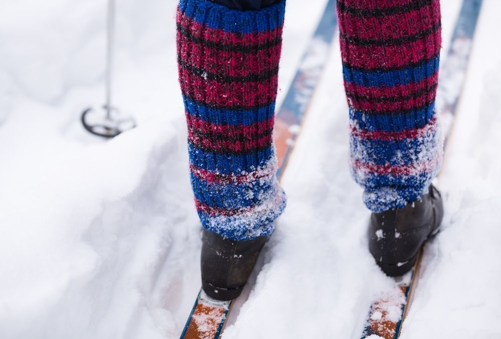 How To Keep Your Feet Warm While Skiing. Commonly used woolen cover on the boot during cross country skiing.